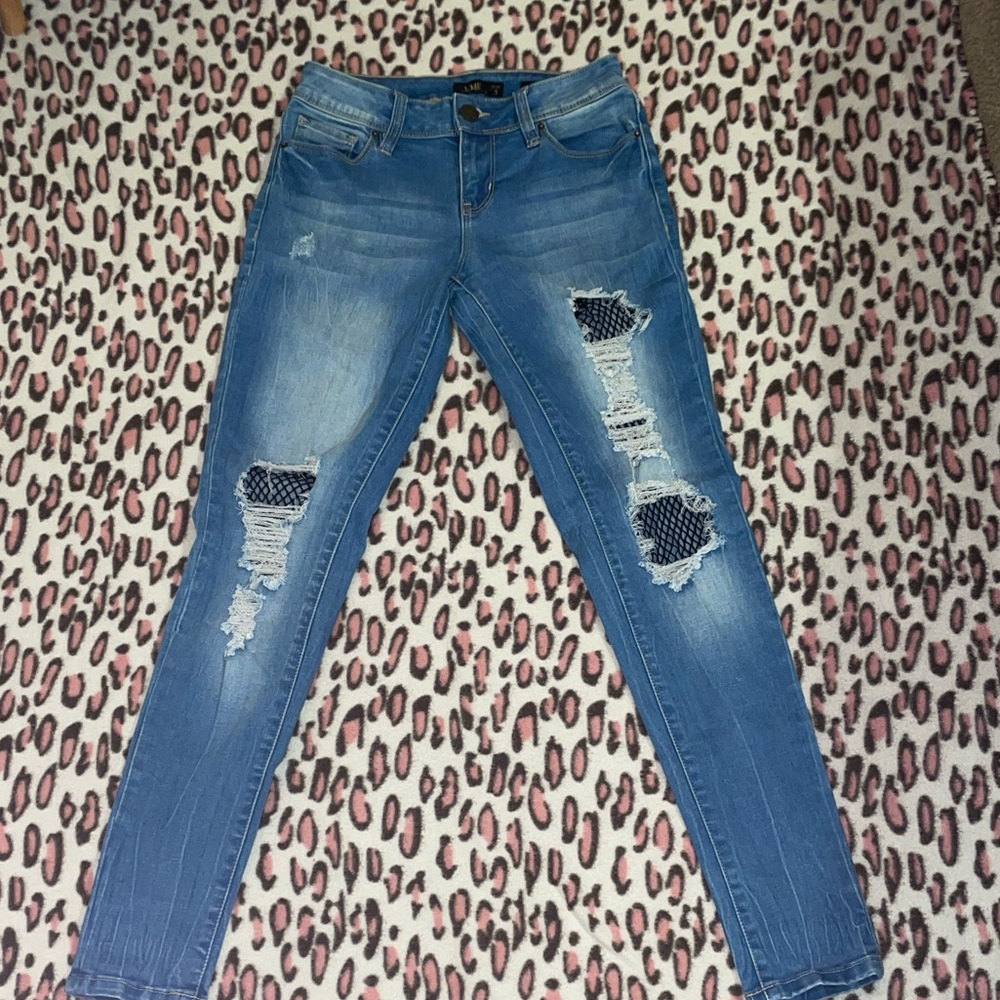 Fishnet destressed jeans